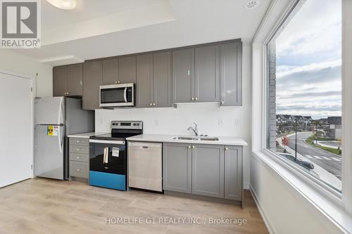 1503 - 160 Densmore Road, Cobourg, ON - Indoor Photo Showing Kitchen With Double Sink