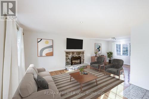 16 Woodvalley Drive, Toronto, ON - Indoor Photo Showing Living Room With Fireplace