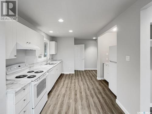 2714-2716 7Th Street E, Saskatoon, SK - Indoor Photo Showing Kitchen