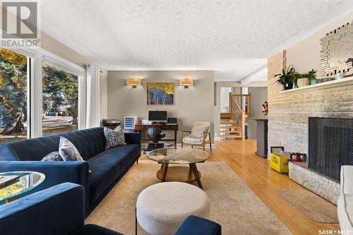 94 Academy Park Road, Regina, SK - Indoor Photo Showing Living Room With Fireplace