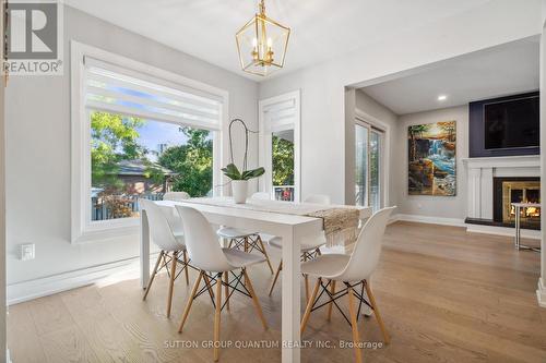 4145 Prince George Avenue, Mississauga, ON - Indoor Photo Showing Dining Room With Fireplace