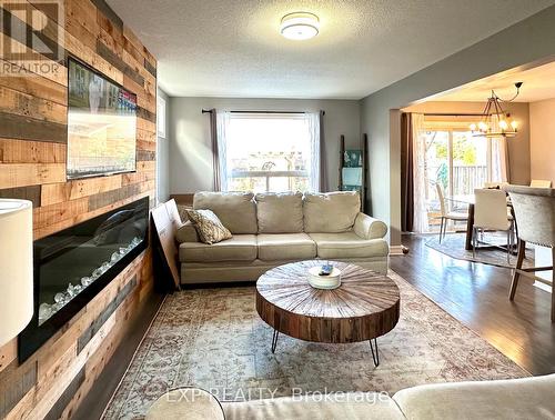 1666 Mcneil Road, London, ON - Indoor Photo Showing Living Room With Fireplace