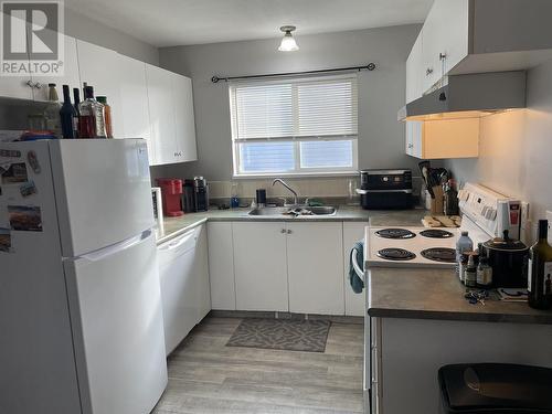 A 10307 90 Street, Fort St. John, BC - Indoor Photo Showing Kitchen With Double Sink