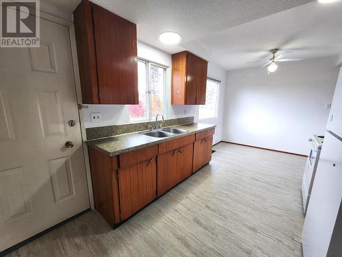 1414-1416 Nation Crescent, Prince George, BC - Indoor Photo Showing Kitchen With Double Sink