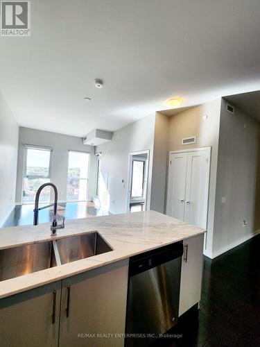 727 - 4055 Parkside Village Drive, Mississauga, ON - Indoor Photo Showing Kitchen With Double Sink