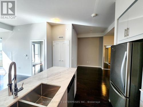 727 - 4055 Parkside Village Drive, Mississauga, ON - Indoor Photo Showing Kitchen With Double Sink