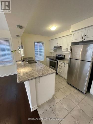 47 - 1000 Aselton Boulevard, Milton, ON - Indoor Photo Showing Kitchen With Double Sink