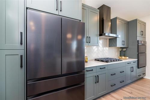 45 Crocus Lane, West St Paul, MB - Indoor Photo Showing Kitchen With Upgraded Kitchen