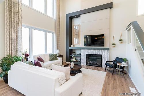 45 Crocus Lane, West St Paul, MB - Indoor Photo Showing Living Room With Fireplace