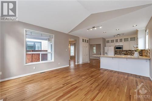 Extended family room provides extra space for large furniture! - 44 Grengold Way, Ottawa, ON - Indoor Photo Showing Kitchen