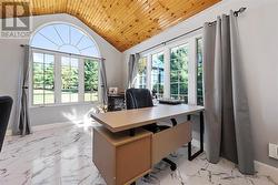 Main floor office with exterior access. - 