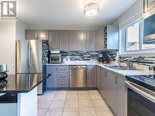 153 - 120 Nonquon Road, Oshawa, ON - Indoor Photo Showing Kitchen With Stainless Steel Kitchen With Double Sink