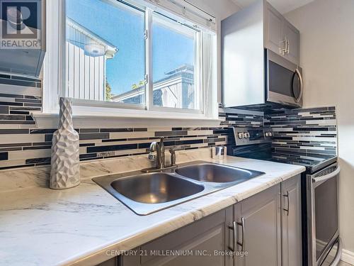 153 - 120 Nonquon Road, Oshawa, ON - Indoor Photo Showing Kitchen With Double Sink