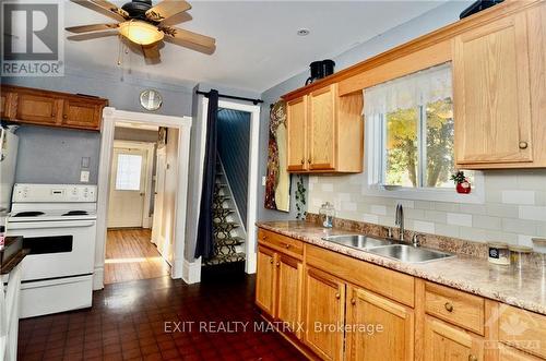 36 Drummond Street, Rideau Lakes, ON - Indoor Photo Showing Kitchen With Double Sink