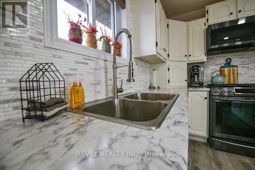 106 Renison Avenue, Timmins (Main Area), ON - Indoor Photo Showing Kitchen With Double Sink