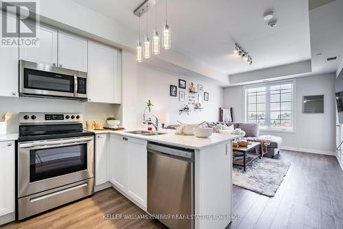 412 - 65 Shipway Avenue, Clarington (Newcastle), ON - Indoor Photo Showing Kitchen With Stainless Steel Kitchen With Double Sink With Upgraded Kitchen