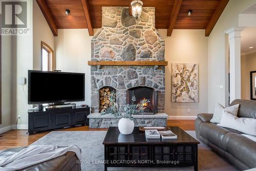 1428 10 Nottawasaga Conc. N, Clearview, ON - Indoor Photo Showing Living Room With Fireplace