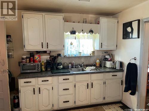 202 3Rd Avenue, Young, SK - Indoor Photo Showing Kitchen With Double Sink