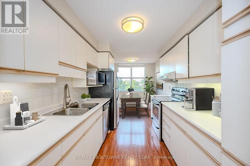 310 - 2199 Sixth Line, Oakville, ON - Indoor Photo Showing Kitchen With Double Sink