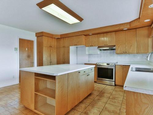 Kitchen - 609 Rue Poitras, L'Épiphanie, QC - Indoor Photo Showing Kitchen With Double Sink