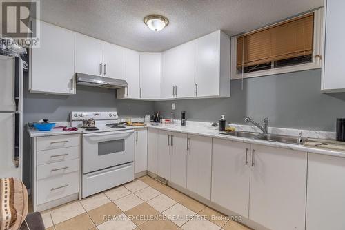 830 Stonegate Drive, Woodstock, ON - Indoor Photo Showing Kitchen With Double Sink