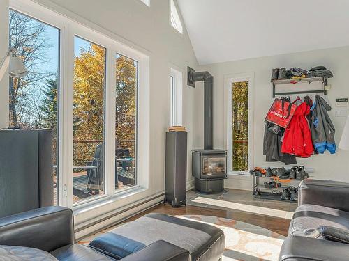 Living room - 167 Ch. Des Merisiers, Lantier, QC - Indoor Photo Showing Living Room With Fireplace