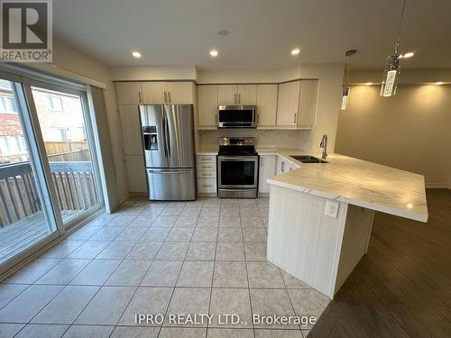 112 Bond Head Court, Milton, ON - Indoor Photo Showing Kitchen With Stainless Steel Kitchen With Double Sink