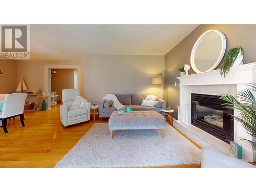 2915 Canada Way, Blind Bay, BC - Indoor Photo Showing Living Room With Fireplace