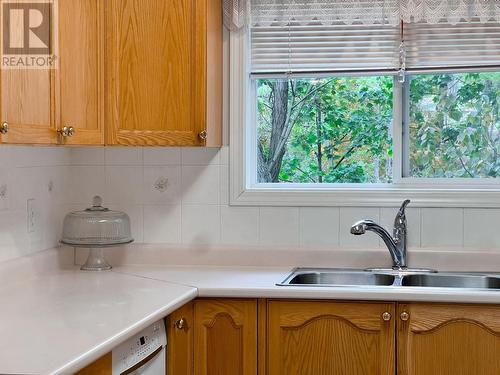 719 11Th  Avenue Unit# 204, Castlegar, BC - Indoor Photo Showing Kitchen With Double Sink