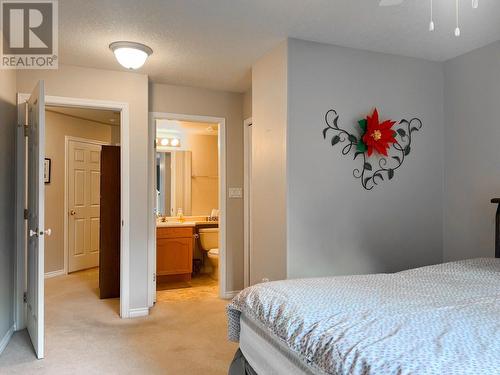 719 11Th  Avenue Unit# 204, Castlegar, BC - Indoor Photo Showing Bedroom