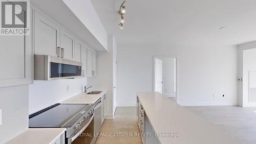 509 - 1063 Douglas Mccurdy Comm, Mississauga, ON - Indoor Photo Showing Kitchen