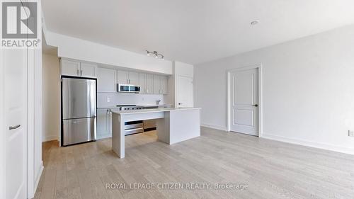 509 - 1063 Douglas Mccurdy Comm, Mississauga, ON - Indoor Photo Showing Kitchen