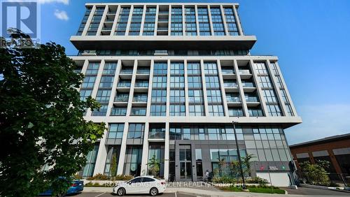 509 - 1063 Douglas Mccurdy Comm, Mississauga, ON - Outdoor With Balcony With Facade