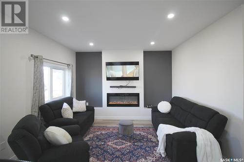 3095 Dumont Way, Regina, SK - Indoor Photo Showing Living Room With Fireplace