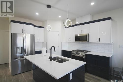 3095 Dumont Way, Regina, SK - Indoor Photo Showing Kitchen With Double Sink With Upgraded Kitchen