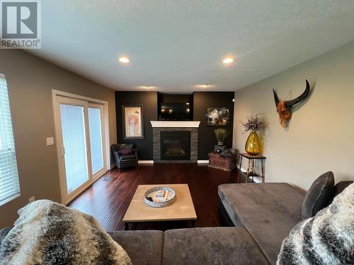 160 Nickel Ridge Avenue, Quesnel, BC - Indoor Photo Showing Living Room With Fireplace