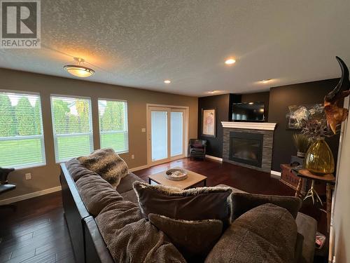 160 Nickel Ridge Avenue, Quesnel, BC - Indoor Photo Showing Living Room With Fireplace