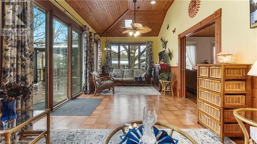 Sunroom / solarium featuring lofted ceiling, ceiling fan, and wooden ceiling - 246 Light Street, Woodstock, ON - Indoor