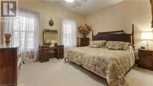 Carpeted bedroom with ceiling fan - 246 Light Street, Woodstock, ON - Indoor Photo Showing Bedroom