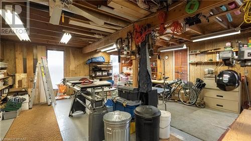 Basement featuring plenty of natural light and wood walls - 246 Light Street, Woodstock, ON - Indoor Photo Showing Basement