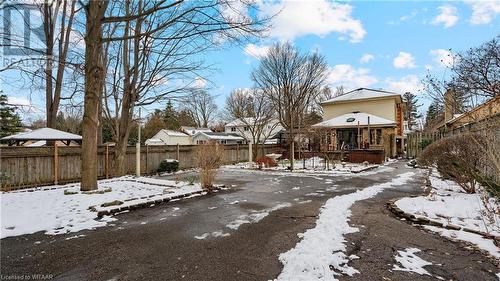 Yard layered in snow featuring a hot tub - 246 Light Street, Woodstock, ON - Outdoor