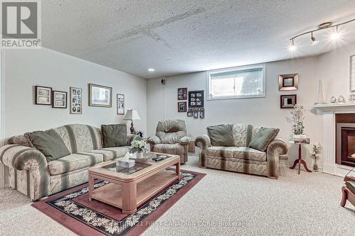 690 Longworth Road, London, ON - Indoor Photo Showing Living Room With Fireplace