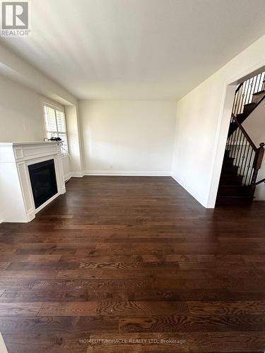 62 Owens Road, New Tecumseth, ON - Indoor Photo Showing Other Room With Fireplace