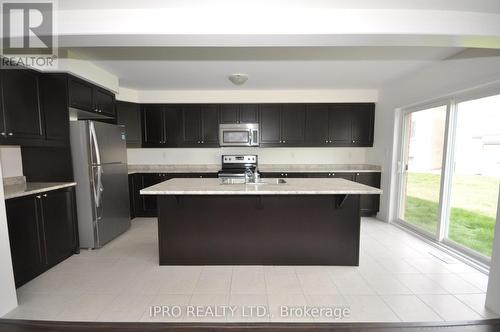 305 Gooding Crescent, Milton, ON - Indoor Photo Showing Kitchen With Double Sink