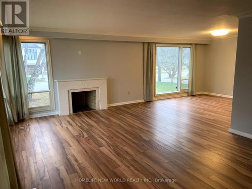 17 Palomino Crescent, Toronto, ON - Indoor Photo Showing Living Room With Fireplace