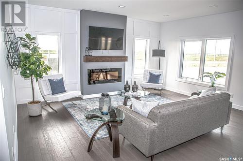 210 Sharma Lane, Saskatoon, SK - Indoor Photo Showing Living Room With Fireplace