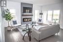 210 Sharma Lane, Saskatoon, SK  - Indoor Photo Showing Living Room With Fireplace 