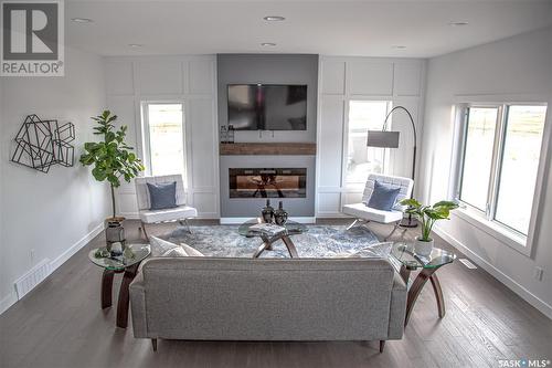 210 Sharma Lane, Saskatoon, SK - Indoor Photo Showing Living Room With Fireplace