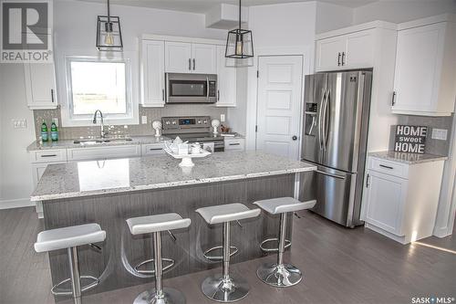 210 Sharma Lane, Saskatoon, SK - Indoor Photo Showing Kitchen With Stainless Steel Kitchen With Upgraded Kitchen