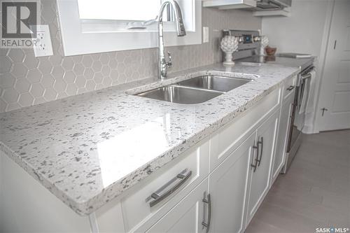 210 Sharma Lane, Saskatoon, SK - Indoor Photo Showing Kitchen With Double Sink